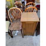 AN ELM SEATED DINING CHAIR AND AN OAK POT CUPBOARD WITH SINGLE DOOR