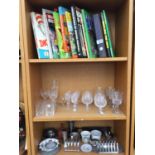 AN ASSORTMENT OF BOOKS, CUT GLASSES AND METAL KITCHEN WARE