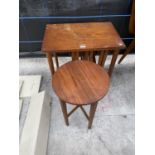 A RETRO TEAK OCCASIONAL TABLE ENCLOSING FOUR ROUND TEAK DROP-LEAF TABLES