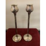 A PAIR OF STERLING SILVER TULIP SHAPED CANDLESTICKS WITH WEIGHTED BASE (HEIGHT 21CM)