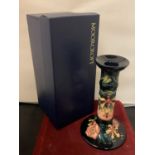 A BOXED MOORCROFT OBERON CANDLESTICK