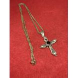 A LARGE SILVER CROSS WITH A RED STONE ON A CHAIN BOTH MARKED 925