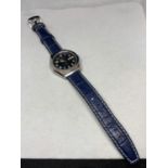 AN ORIENT CRYSTAL 21 JEWELS WRIST WATCH WITH BLUE LEATHER STRAP IN WORKING ORDER