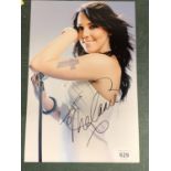 A SIGNED PHOTGRAPH OF SPICE GIRL MEL C