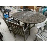 A LARGE GARDEN TABLE TO INCLUDE A WOODEN GARDEN LOVE SEAT