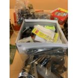 AN ASSORTMENT OF MODEL TRAIN PARTS FOR COMPLETION AND REPAIR