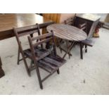 A WOODEN GARDEN TABLE AND FOUR FOLDING CHAIRS