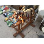 A VINTAGE CHILDRENS ROCKING HORSE