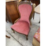 A MAHOGANY NURSING CHAIR