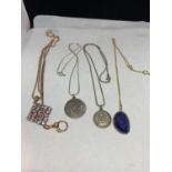 FOUR SILVER NECKLACES TO INCLUDE TWO WITH ST CHRISTOPHER PENDANTS, A LARGE BLUE STONE AND A LARGE