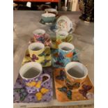 THREE AYNSLEY FINE CHINA CUPS AND SAUCERS AND A GROUP OF COLOURFUL PORCELAIN TEAWARE
