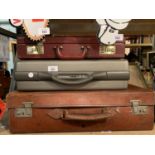 A SAMSONITE RG CASE, A FAUX LEATHER BRIEFCASE AND A VINTAGE SUITCASE