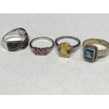 FOUR ASSORTED SILVER RINGS