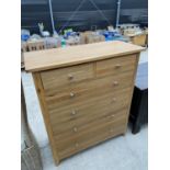 A MODERN OAK CHEST OF TWO SHORT AND FOUR LONG DRAWERS 39.5" WIDE