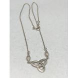 A SILVER NECKLACE WITH CELTIC STYLE PENDANT BOTH MARKED 925