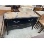 A PARTLY DISTRESSED CONTINENTAL STYLE CHEST OF TWO DRAWERS, 47" WIDE