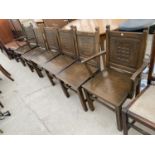 A SET OF SIX MID 20TH CENTURY OAK JACOBEAN STYLE DINNIG CHAIRS (TWO CARVERS)