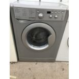 AN INDESIT IWDD71435 WASHING MACHINE BELIEVED WORKING ORDER BUT NO WARRENTY