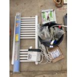A WALL TOWEL RADIATOR WITH FURTHER ITEMS