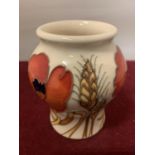 A MOORCROFT 3 INCH POPPY VASE