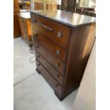 AN OAK CHEST OF FIVE DRAWERS