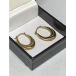 A PAIR OF 9 CARAT GOLD PLATED HOOP EARRINGS MARKED 925 AND 9 CARAT BONDED IN A PRESENTATION BOX