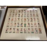 A FRAMED COLLECTION OF PLAYERS CIGARETTE FOOTBALL CARDS