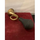 A VINTAGE BRASS CAR HORN