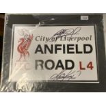 A MOUNTED ANFIELD SIGN TO INCLUDE THREE LIVERPOOL PLAYERS SIGNATURES. KEVIN KEEGAN ETC COMPLETE WITH