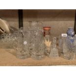 A QUANTITY OF GLASSWARE TO INCLUDE CUTGLASS TANKARDS AND BOWLS ETC