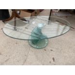 A DANNY LANE STYLE OVAL COFFEE TABLE ON STEPPED SINGLE PILLAR, 47x25.5"
