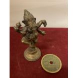 A SINO-TIBETAN BI-METAL BRASS MODEL OF GANESH AND CHINESE BRASS AMULET COIN