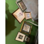 AN ASSORTMENT OF FRAMED PRINTS