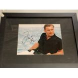 A FRAMED SIGNED PHOTOGRAPH OF BRITISH ACTOR JUDE LAW