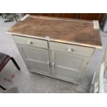 AN OAK SHABBY CHIC DRESSER BASE WITH TWO DOORS AND TWO DRAWERS