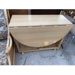 A MODERN DROP-LEAF KITCHEN TABLE AND A PAIR OF STOOLS