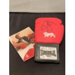 AN ANTHONY JOSHUA SIGNED BOXING GLOVE AND A SIGNED PICTURE COMPLETE WITH A CERTIFICATE OF