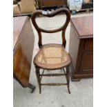 A VICTORIAN BEECH PUNISHMENT CHAIR