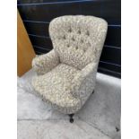 A MODERN BUTTON-BACK EASY CHAIR ON FRONT CABRIOLE LEGS