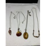 FOUR VARIOUS SILVER NECKLACES WITH AMBER STYLE STONE PENDANTS