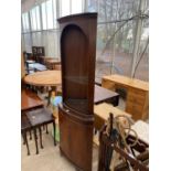 A MAHOGANY CORNER CABINET WITH LOWER DOOR AND UPPER GLASS SHELVING