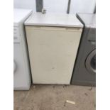 A WHITE TURBO LARDER UNDER COUNTER FRIDGE BELIEVED IN WORKING ORDER BUT NO WARRANTY