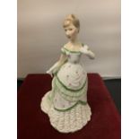 A ROYAL WORCESTER FIGURINE BELLE OF THE BALL