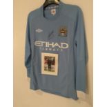 A SIGNED MANCHESTER CITY SHIRT ROBERTO MANCINI WITH A PHOTOGRAPH COMPLETE WITH CERTIFICATE OF