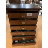 A SIX DRAWER JEWELLERY BOX AND CONTENTS