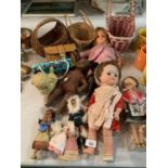AN ASSORTMENT OF DOLLS, WICKER BASKETS AND HAND BAGS ETC