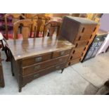 A SATINWOOD CHEST OF TWO SHORT AND TWO LONG DRAWERS AND AN OAK CHEST OF SIX DRAWERS