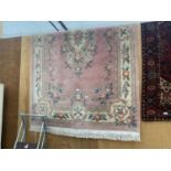 A PINK FLORAL CHINESE CARPET 58 X 98"