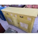 A SHABBY CHIC SIDEBOARD WITH TWO DOORS, TWO DRAWERS AND UNICORN DECORATION