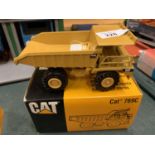 A CATERPILLAR 'CAT 769C' OFF HIGHWAY DUMPER TRUCK WITH BOX